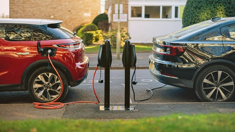 On-street electric vehicle charging points serving parked cars on a residential road