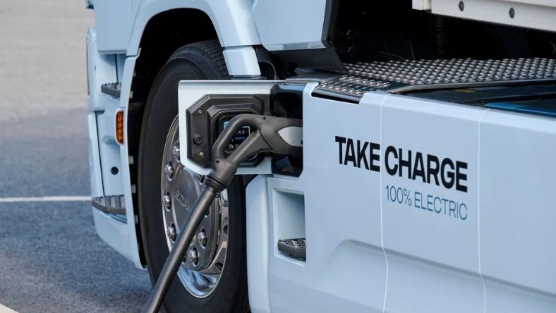 Electric truck charging at depot with cable connected